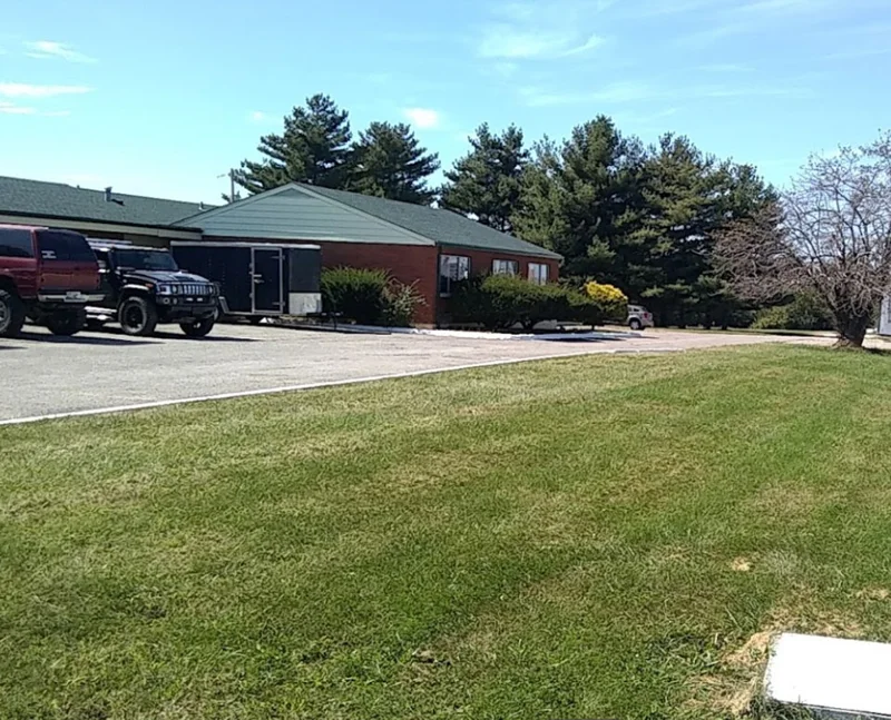 Motel exterior and green lawn